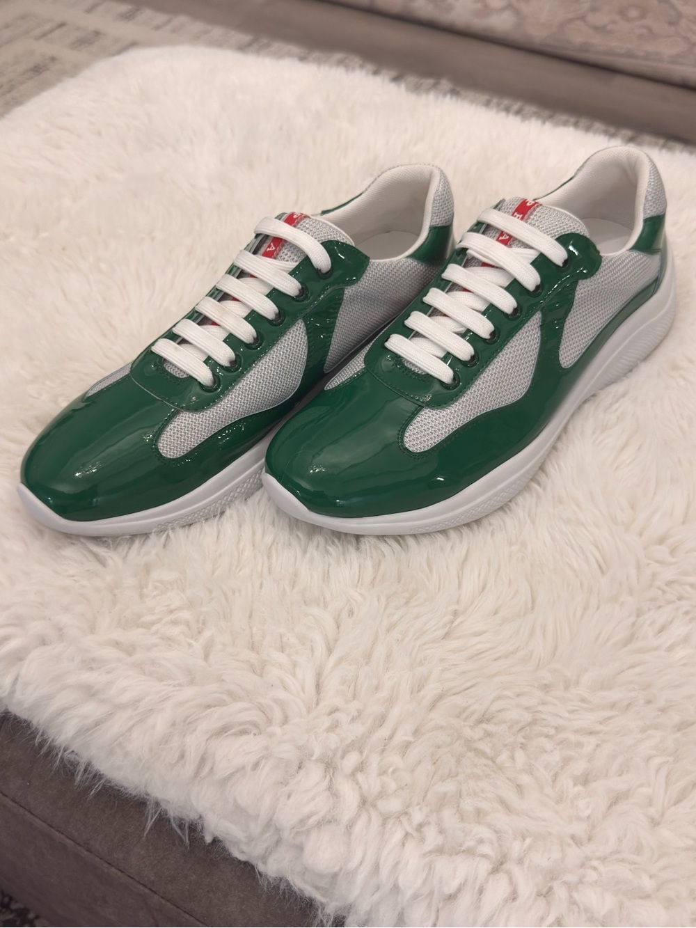 green and silver Prada America's Cup